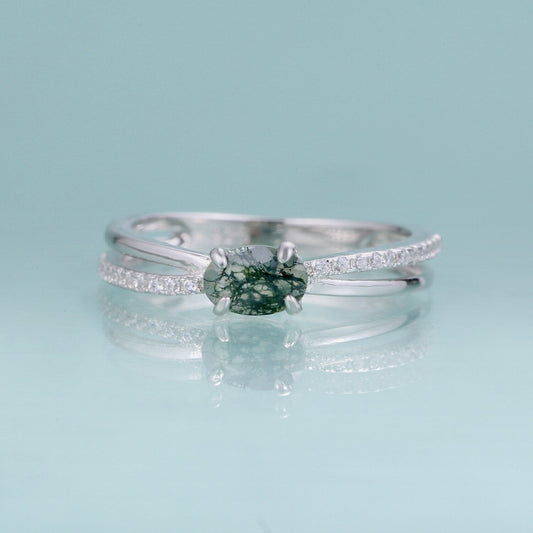 Moss agate wedding ring with a cross-shaped design in silver