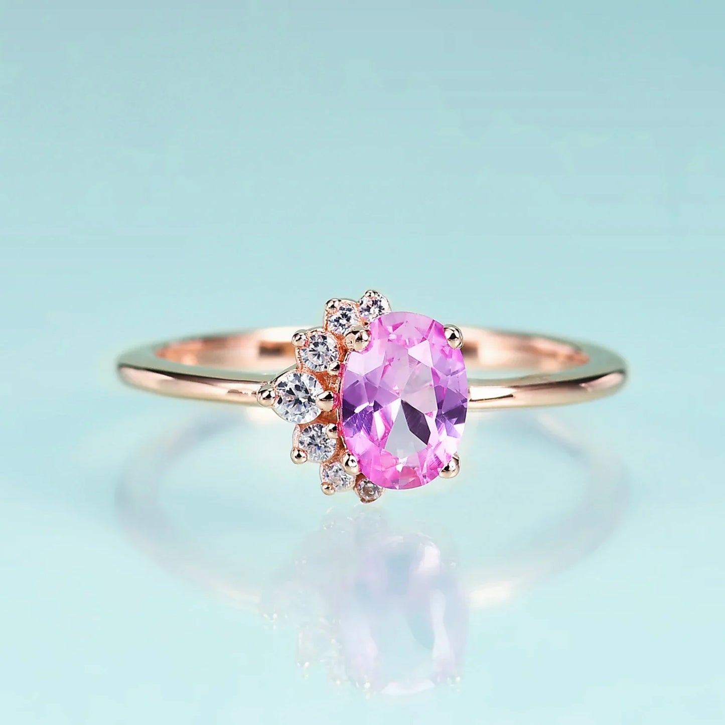 Rose gold moonstone ring with clear cz arranged in a half circle wedding ring for women
