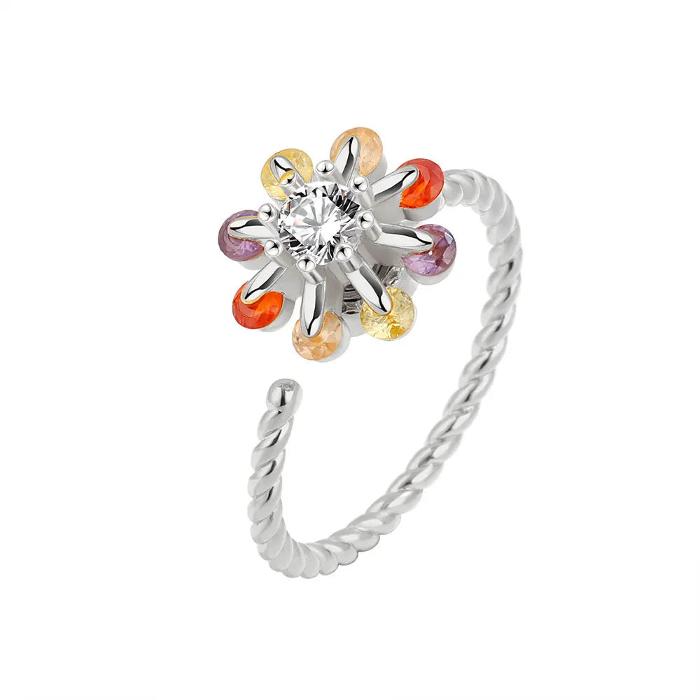 Silver anxiety ring with a colorful charm spinner ring