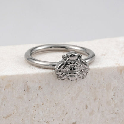 Cute helix piercing with a bee titanium earring hoops