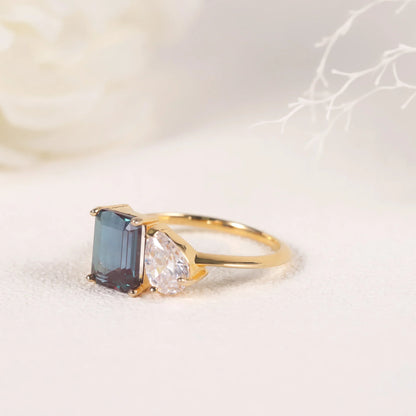 You and me ring with a color-changing alexandrite stone and a clear cz