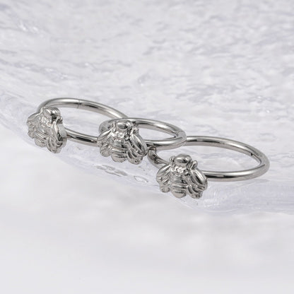 Cute helix piercing with a bee titanium earring hoops