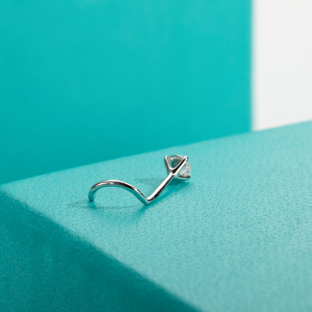 20G 14K white gold nose stud with moissanite