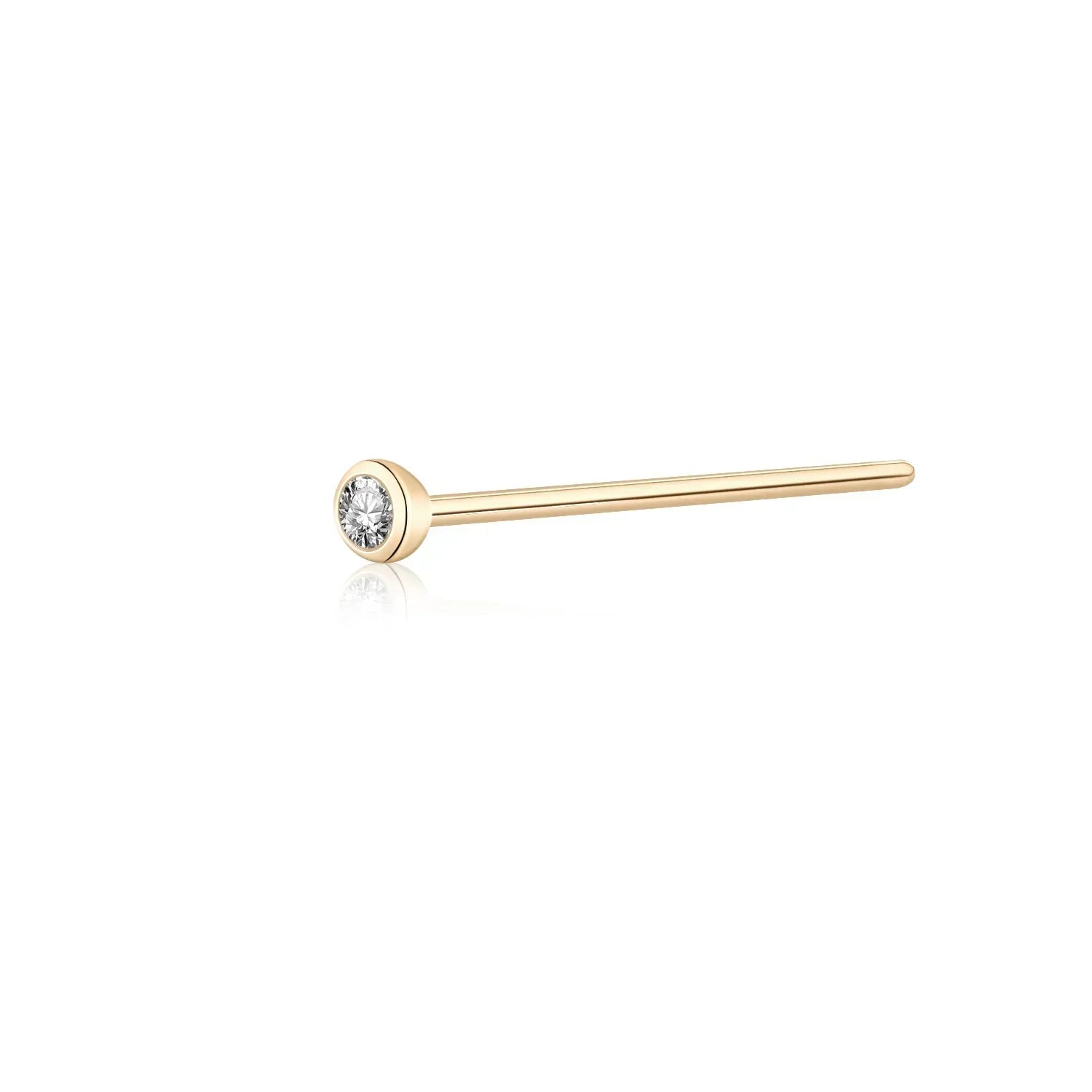 Minimalist gold stud earring with small round clear gemstone on white background, Rosary Milano