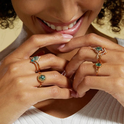 Moss agate wedding ring set with a pear-shaped moss agate sterling silver