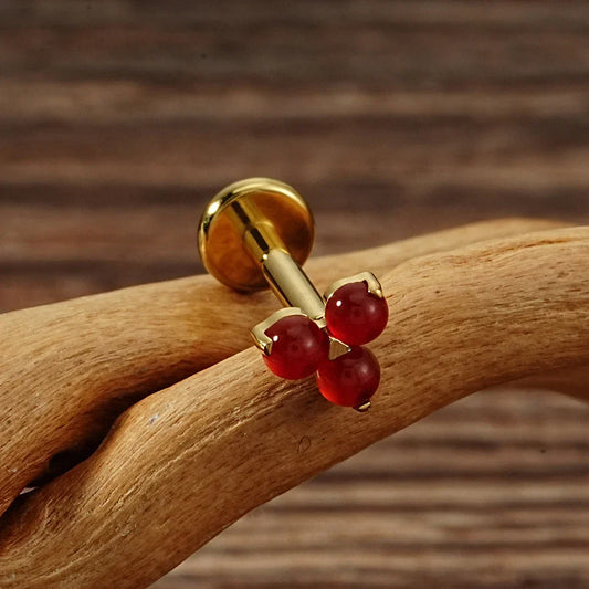 Cute Monroe piercing with natural gemstones red and green stones in silver and gold small Marilyn Monroe piercing titanium 16G