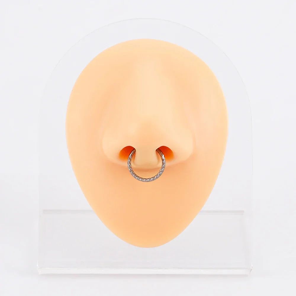 Titanium daith ring with braided inlay in gold and silver 16G septum clicker ring