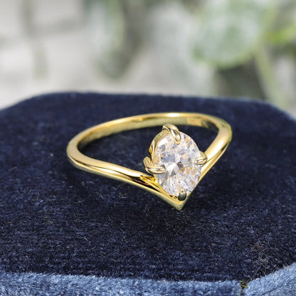 Curved moissanite wedding band oval cut