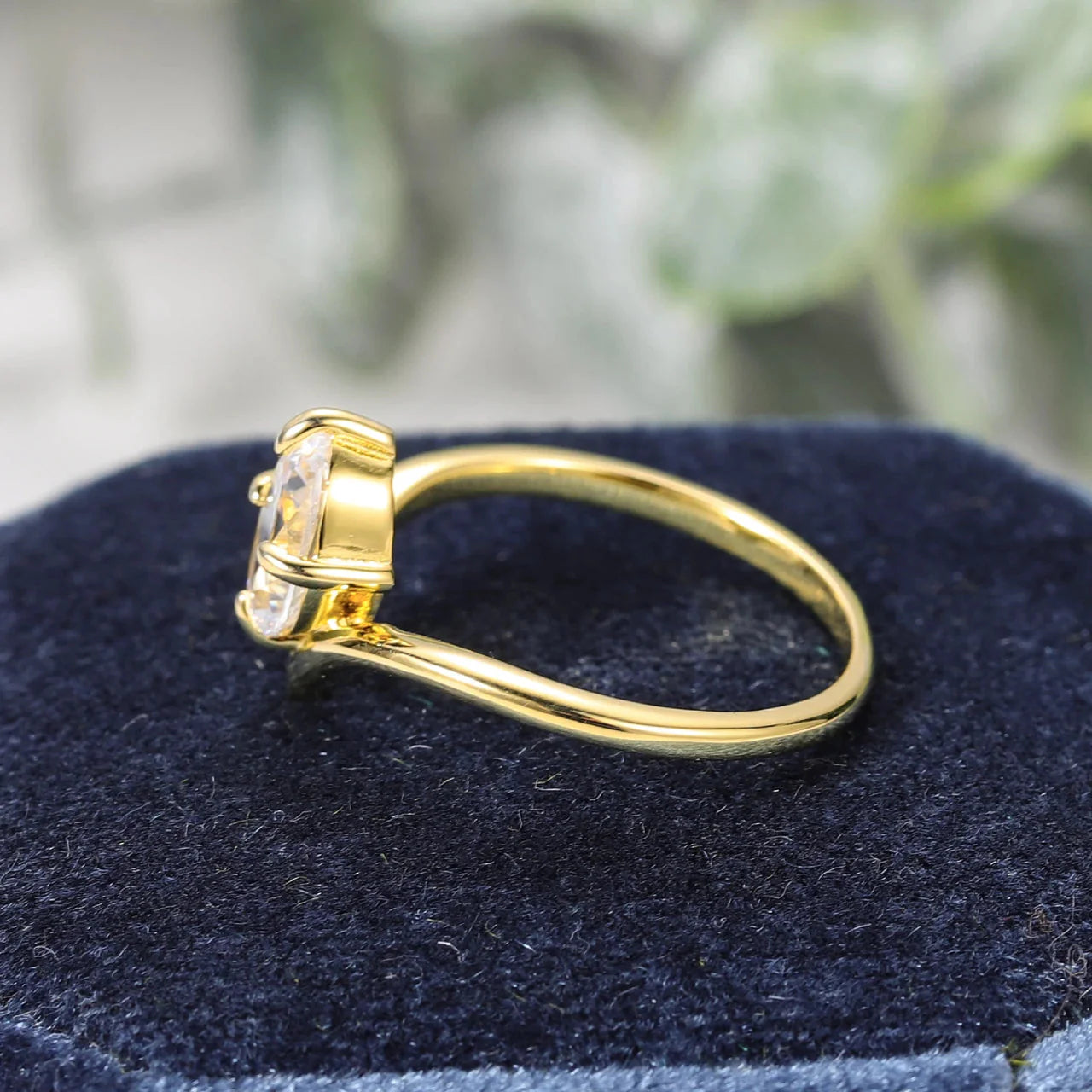 Curved moissanite wedding band oval cut