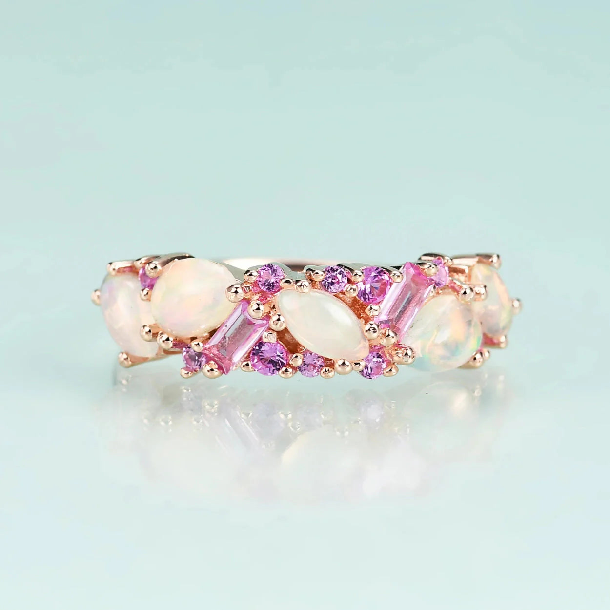 Ethiopian opal ring with pink sapphire semi-eternity ethiopian opal engagement ring