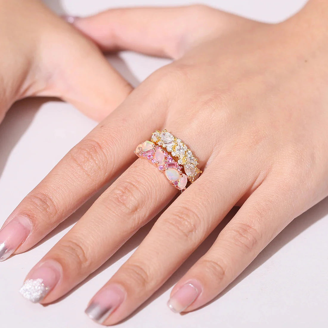 Ethiopian opal ring with pink sapphire semi-eternity ethiopian opal engagement ring
