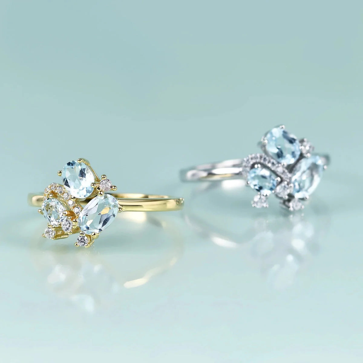 Three-stone blue topaz ring