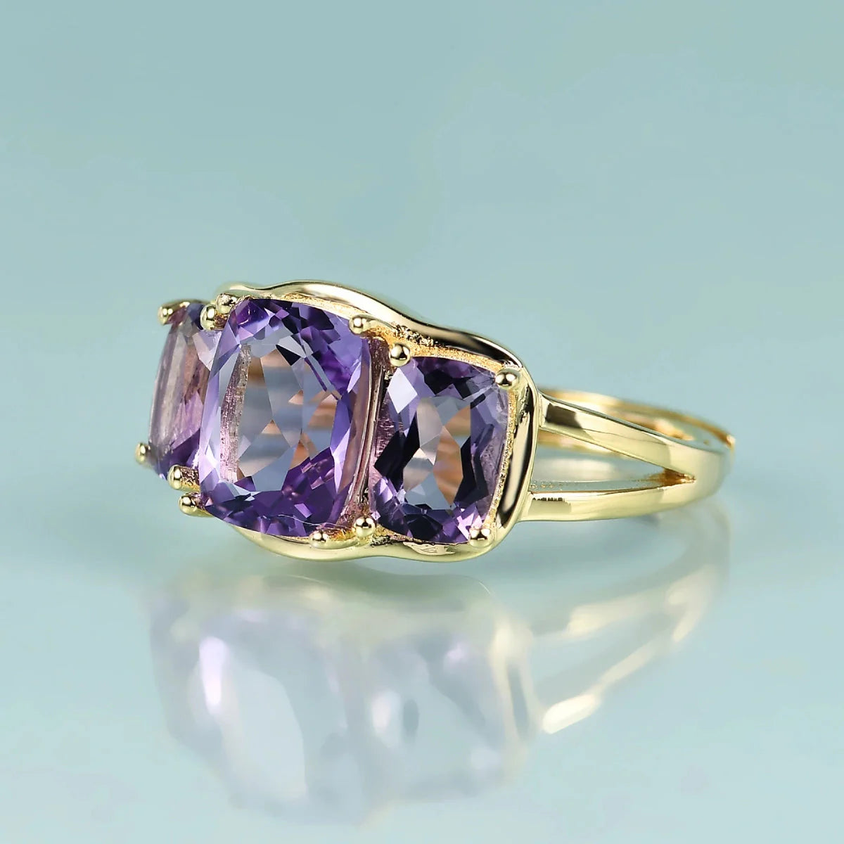 Three-stone trellis amethyst ring