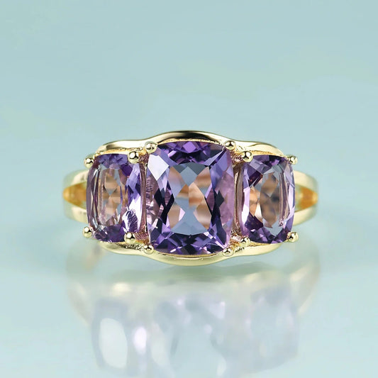Three-stone trellis amethyst ring