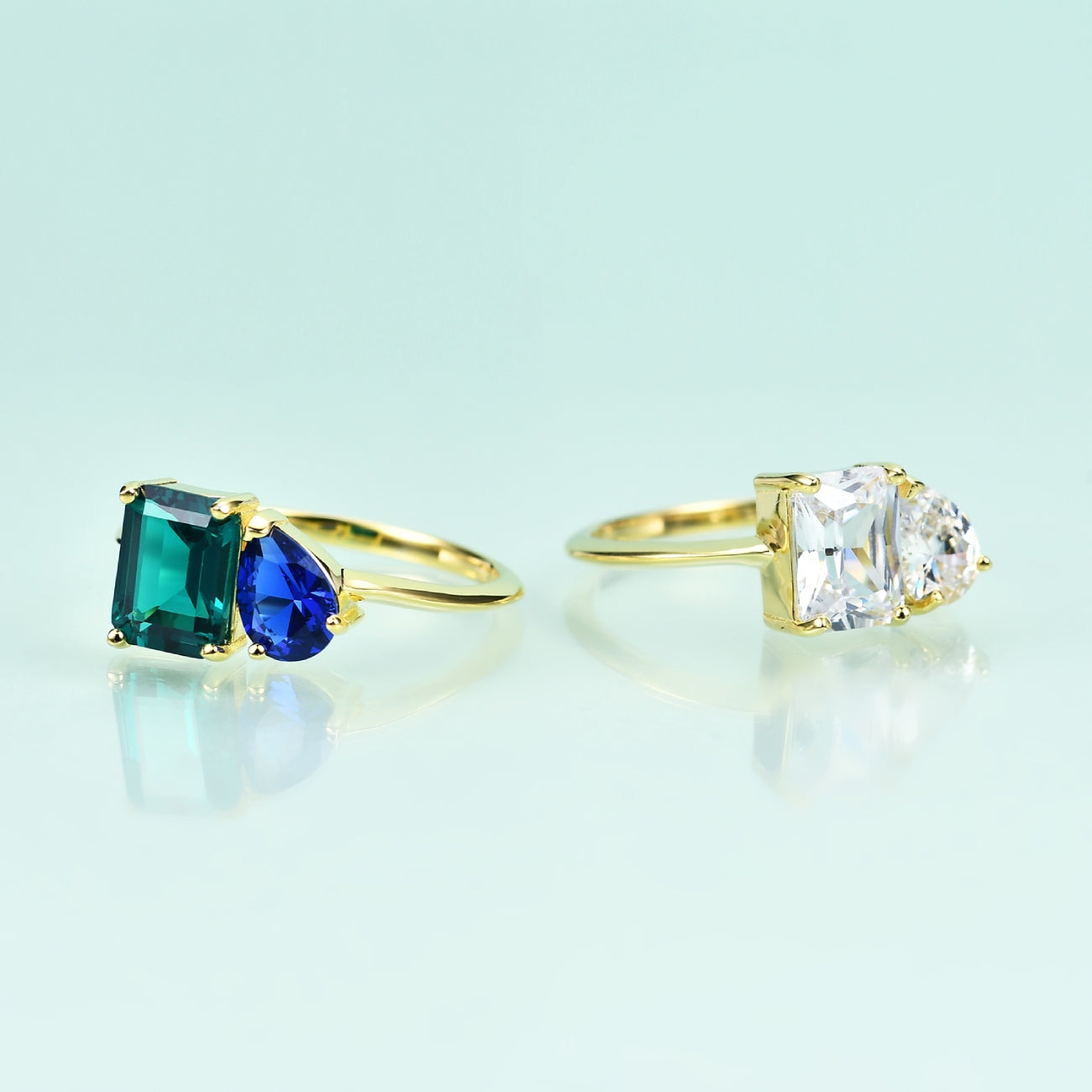 Toi et moi ring emerald and sapphire